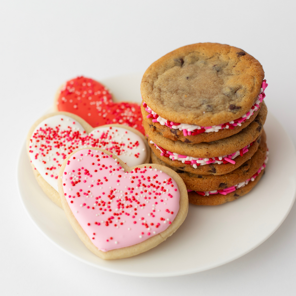 Valentine's heart-shaped sugar cookies and chocolate chip buttercream sammies with sprinkles